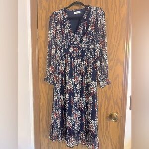 Mopoogoss Dress Size Medium Navy Blue w/ Flowers Long w/ an Under lining.